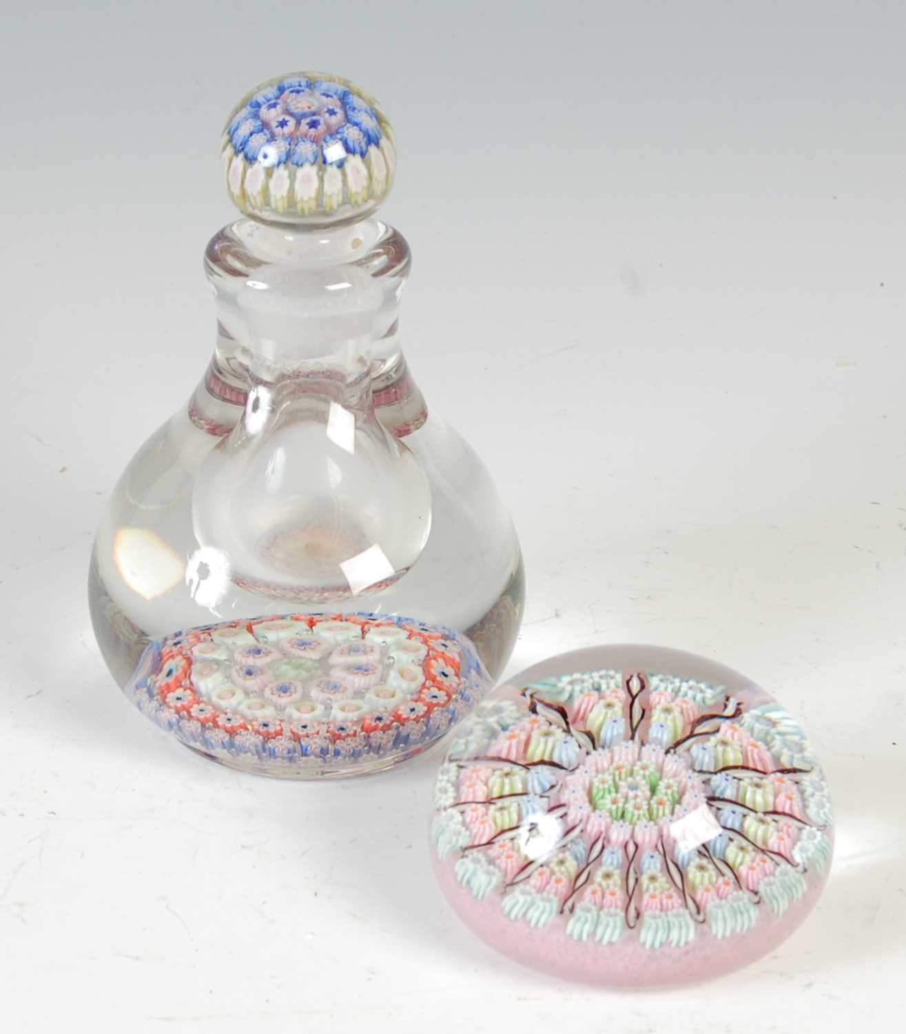 Lot 464 - A pink ground millefiori glass paperweight,...