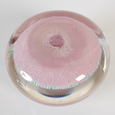 Lot 464 - A pink ground millefiori glass paperweight,...