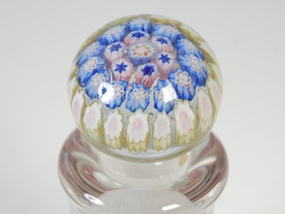 Lot 464 - A pink ground millefiori glass paperweight,...