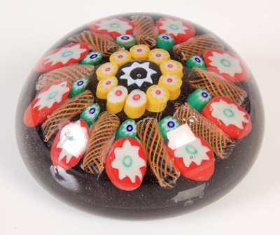 Lot 469 - A collection of six Ysart paperweights,...