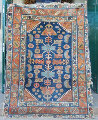 Lot 1058 - A Persian rug, late 19th / early 20th century,...
