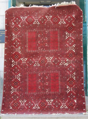 Lot 1059 - A Persian Tekke type rug, early 20th century,...