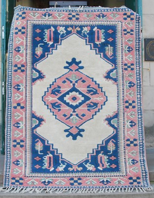 Lot 1065 - A Persian rug, 20th century, the blue and...