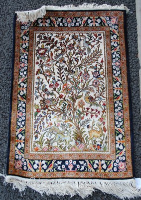 Lot 1071 - A Persian silk mat, 20th century, the beige...