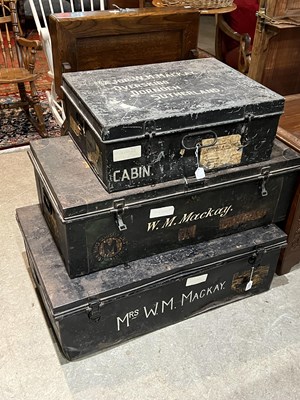 Lot 990 - Three Japanned metal storage trunks, the two...