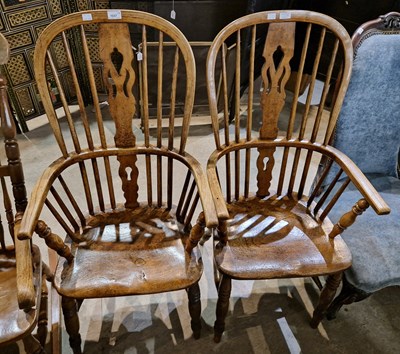 Lot 1037 - A pair of antique Windsor armchairs.