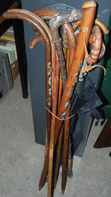 Lot 1039 - A collection of ten assorted walking sticks,...