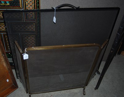 Lot 1045 - A rectangular black painted spark guard and a...