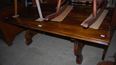 Lot 993 - A mahogany coffee table with shaped legs...