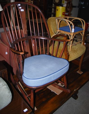 Lot 1014 - A dark wood rocking chair, together with a...
