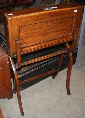 Lot 1016 - A 20th century oak campaign desk, the...