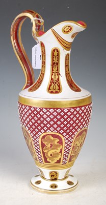 Lot 22 - A Bohemian opaque white and ruby glass jug...