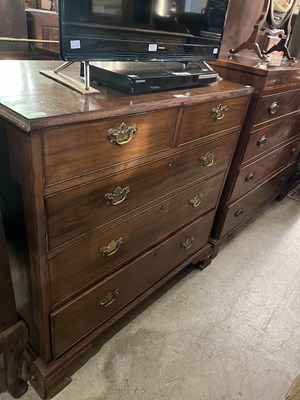 Lot 746 - A George III mahogany chest of two short over...