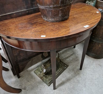 Lot 780 - A 19th century mahogany demi-lune console...