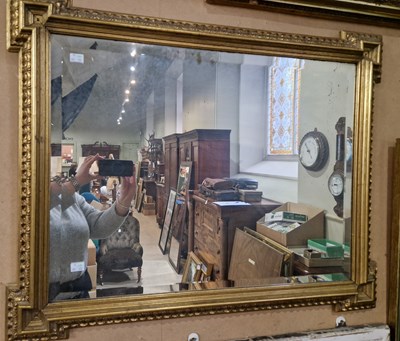 Lot 626 - An antique rectangular wall mirror with...