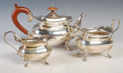 Lot 114 - An early 20th century three-piece silver...