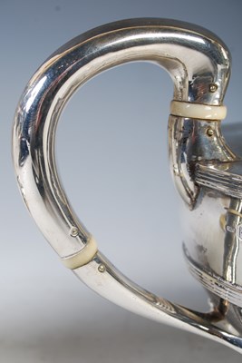 Lot 115 - An early 20th century four-piece silver teaset,...