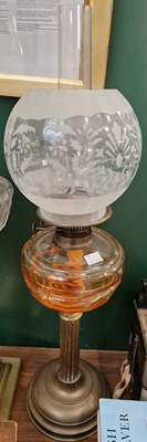 Lot 284 - A 20th century oil lamp with frosted glass...