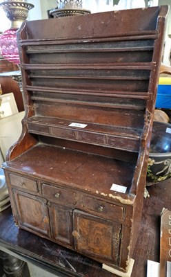 Lot 429 - An antique apprentice stained wooden dresser.