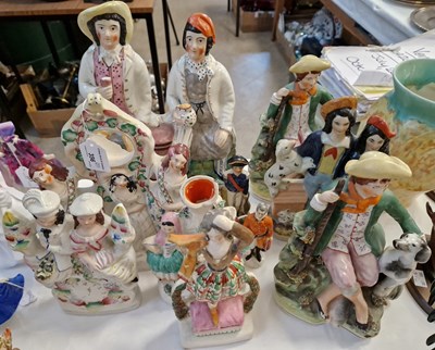 Lot 356 - A group of nine Staffordshire flatback figures...