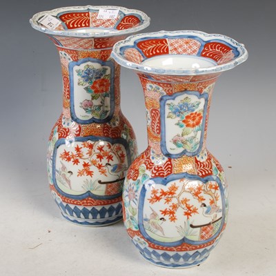 Lot 371 - A near pair of Japanese Imari pattern vases,...