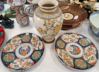 Lot 372 - A pair of Japanese Imari pattern chargers...