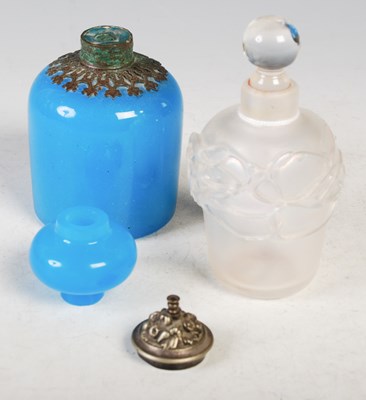 Lot 8 - An iridescent glass perfume bottle with clear...