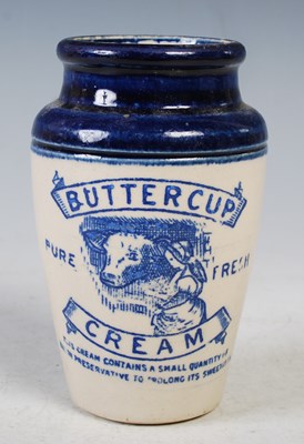 Lot 15 - A vintage stoneware Buttercup Cream butter pot,...