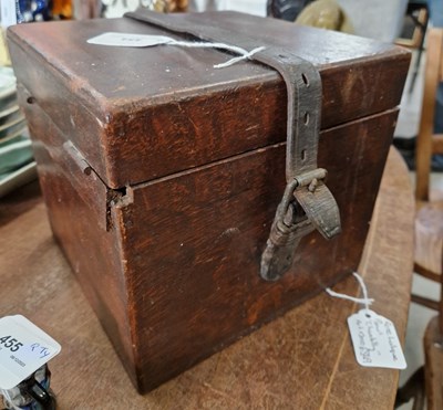 Lot 454 - An antique squeeze box with fret-cut ends and...