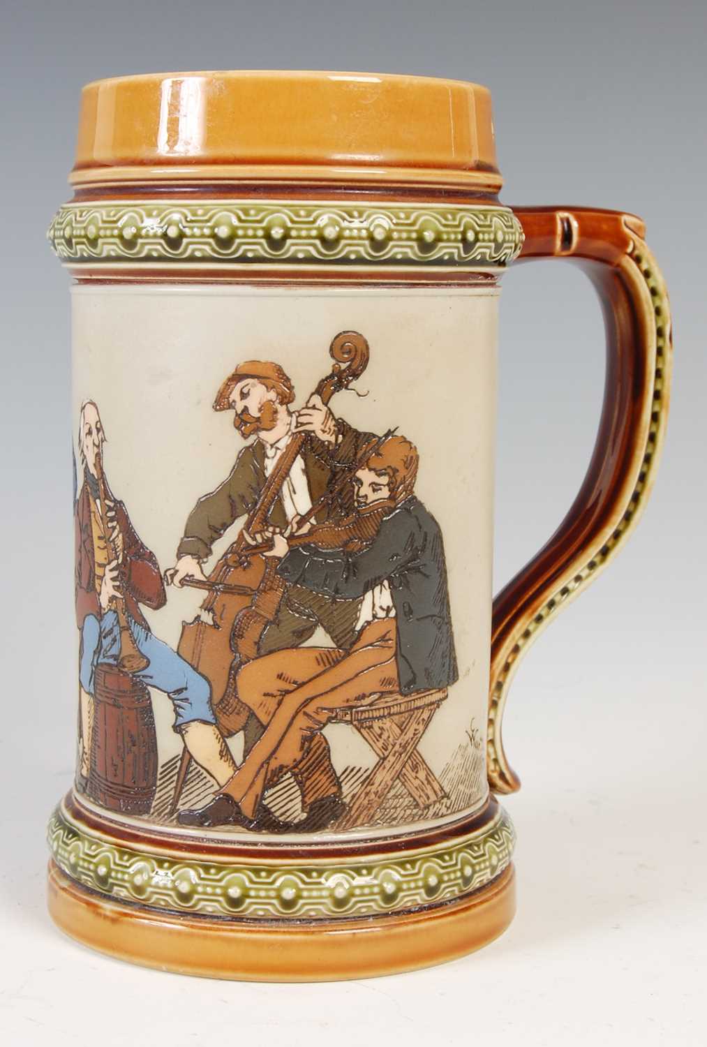 Lot 513 - A Mettlach stoneware beer stein, with incised...