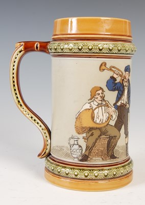 Lot 513 - A Mettlach stoneware beer stein, with incised...