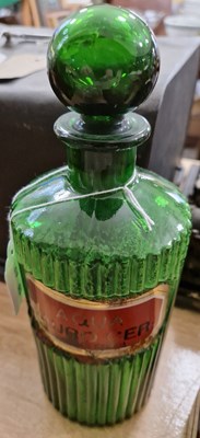 Lot 481 - An early 20th century green glass apothecary...