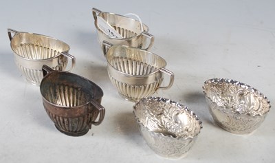 Lot 167 - A set of four Sheffield silver oval shaped...