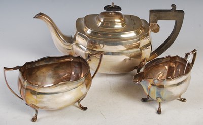 Lot 230 - An electroplated three piece tea set by Walker...