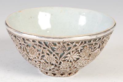 Lot 521 - A Chinese porcelain celadon glazed bowl, Qing...