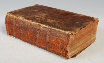 Lot 101 - An 18th century leather bound Holy Bible...