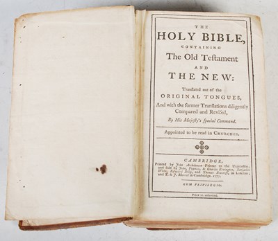 Lot 101 - An 18th century leather bound Holy Bible...