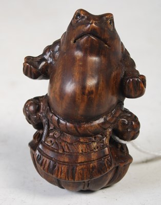 Lot 104 - A boxed Chinese green stone figure of a lady...