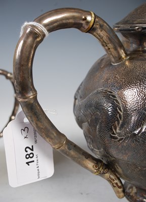 Lot 182 - A Chinese silver three-piece teaset, makers...