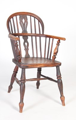 Lot 21 - A 19th century ash and elm Windsor chair, on...