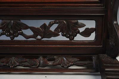 Lot 187 - A Chinese porcelain and dark wood table screen,...