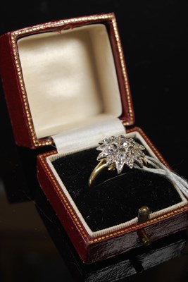 Lot 41 - An 18ct yellow gold, silver and diamond set...