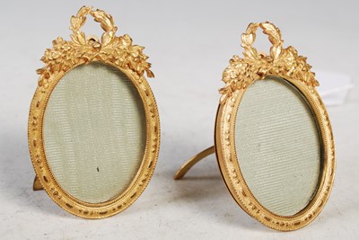 Lot 212 - A pair of early 20th century gilt metal oval...