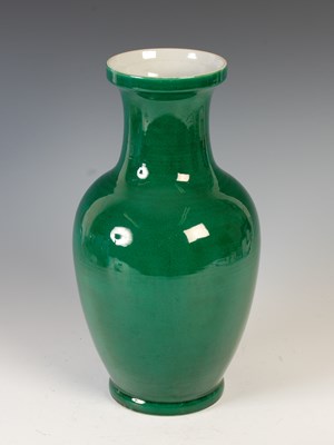 Lot 302 - A Chinese porcelain green ground monochrome...