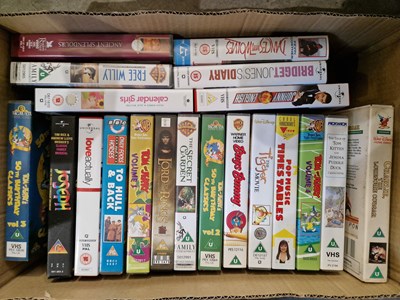 Lot 514 - A box of assorted VHS tapes to include various...