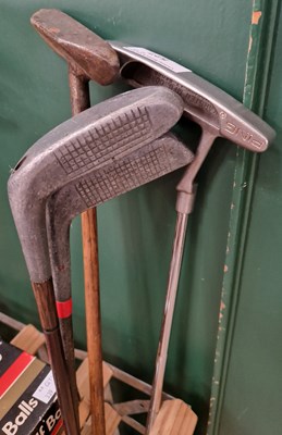 Lot 527 - A group of four assorted vintage golf clubs...