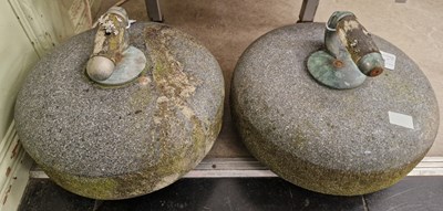 Lot 528 - Two granite curling stones.