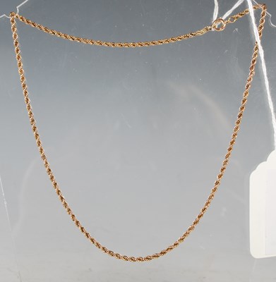 Lot 52 - A yellow metal rope twist necklace, stamped...