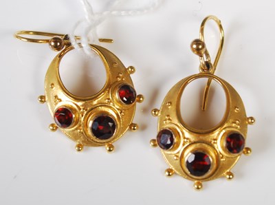 Lot 73 - A pair of 9ct gold and garnet pendant earrings...