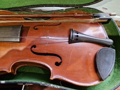 Lot 640 - An antique violin in a fitted black case, with...